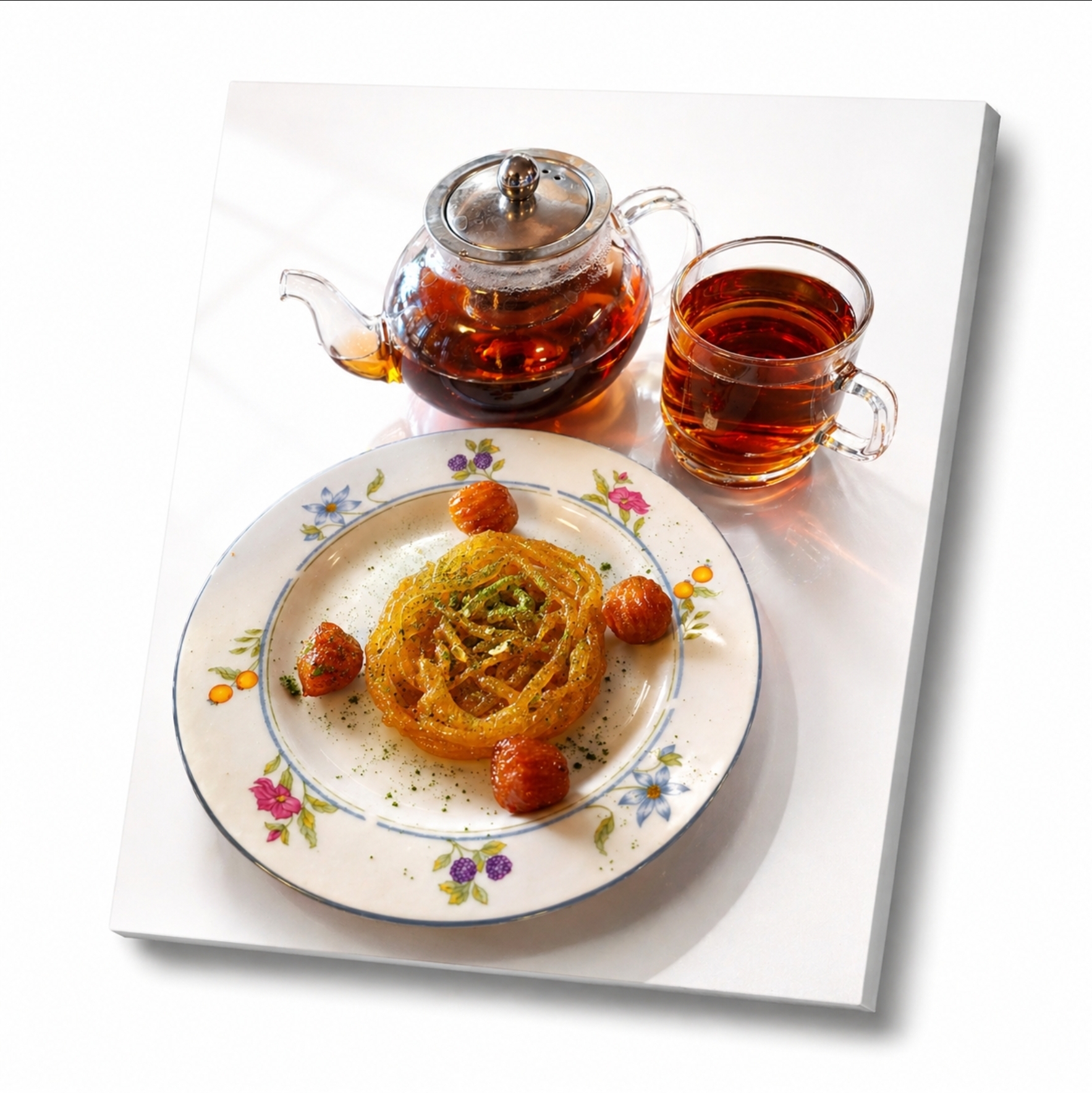Black tea and zolobieyeh and Bamiyeh